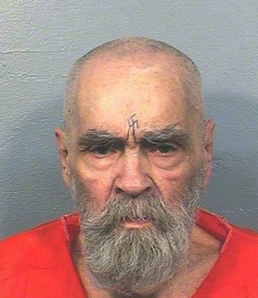 FILE - This Aug. 14, 2017 file photo provided by the California Department of Corrections and Rehabilitation shows Charles Manson. The corpse of Manson will remain in a morgue for at least another month before would-be heirs can argue in court over who gets his remains. A Kern County Superior Court commissioner on Wednesday, Jan. 31, 2018, set a March 7 hearing in the dispute. (California Department of Corrections and Rehabilitation via AP, File)