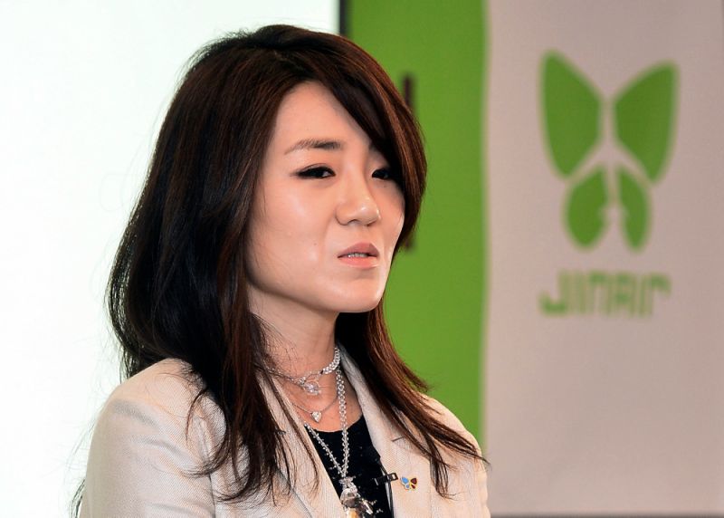 FILE - In this June 27, 2014 file photo, Korean Air senior Vice President Cho Hyun-min, also known as Emily Cho, speaks during a press conference in Seoul, South Korea. Korean Air Lines said Monday, April 23, 2018, that two daughters of its chairman will resign from their executive positions amid mounting public criticism over the women's behavior and the family's smuggling allegations. (Kang Jin-hyung/Newsis via AP, File)