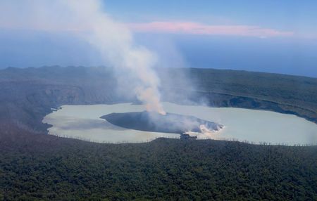 Smoke and ash emanates from the Manaro Voui volcano located on Vanuatu's northern island Ambae in the South Pacific
