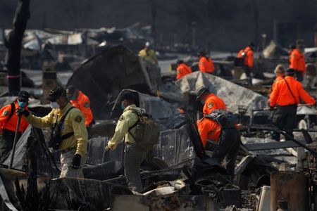 Search and Rescue teams search for two missing people amongst ruins at Journey's End Mobile Home Park destroyed by the Tubbs Fire in Santa Rosa. 


REUTERS/Stephen Lam