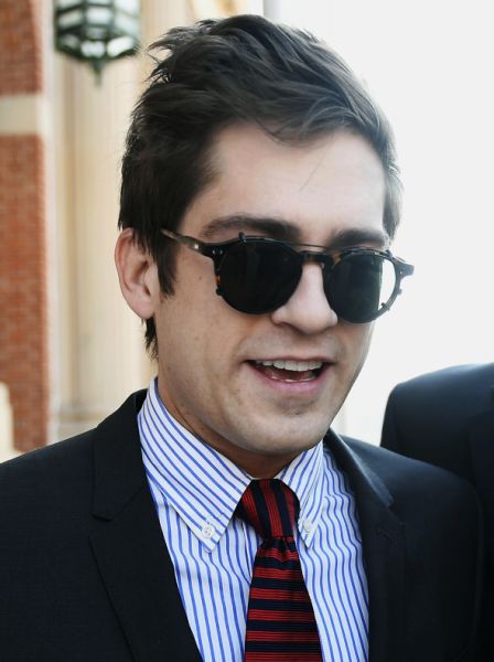 Lucian Wintrich, White House correspondent for the right-wing blog Gateway Pundit, leaves Rockville Superior Court in Vernon, Conn., Monday, Dec. 11, 2017. Charges of breach of peace against Wintrich were dropped stemming from a Nov 28 incident at the University of Connecticut at which Wintrich delivered a speech titled