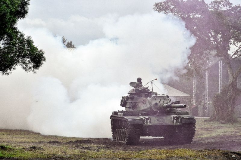 A tank takes part in an annual live-fire drill in eastern Taiwan to 