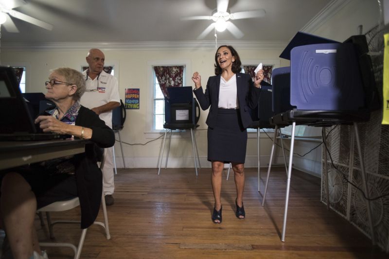 FILE - In this June 12, 2018 file photo, South Carolina Rep. Katie Arrington, who is running for the first district of South Carolina, celebrates after casting her vote at Bethany United Methodist Church in Summerville. Arrington who defeated U.S. Rep. Mark Sanford in his re-election bid has been seriously injured in a deadly wreck. Spokesman Michael Mule tells media outlets Arrington has undergone surgery for her injuries and was recovering Saturday, June 23, 2018, in a Charleston-area hospital. (Kathryn Ziesig/The Post And Courier via AP, File)