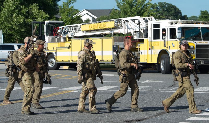 Police responding to a shooting at the Capital Gazette newspaper offices in Annapolis, Maryland, June 28, 2018
