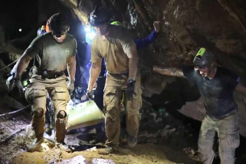 The boys were brought out in a risky operation that involved diving them through waterlogged passages while they were sedated (AFP Photo/Handout)