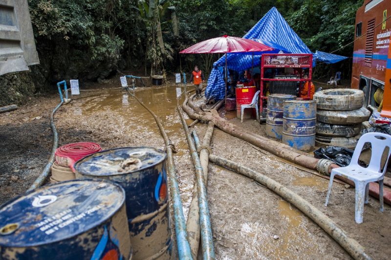 Heavy rains are expected to lash northern Thailand for weeks, soaking through the mountain and filling up the cave as fast as -- or even faster than -- water can be drained (AFP Photo/YE AUNG THU)