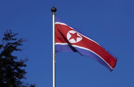 FILE PHOTO: A North Korean flag flies on a mast at the Permanent Mission of North Korea in Geneva October 2, 2014.   REUTERS/Denis Balibouse/File Photo