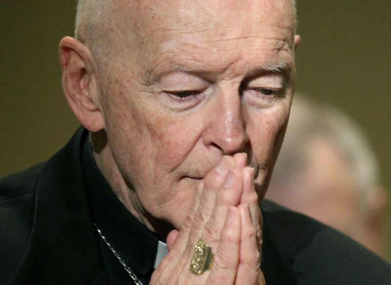 FILE - In this Nov. 14, 2011, file photo, then Cardinal Theodore McCarrick prays during the United States Conference of Catholic Bishops' annual fall assembly in Baltimore. In a document, Archbishop Carlo Maria Vigano denounced the official Vatican silence about his claims and accused Pope Francis of mounting a campaign of 