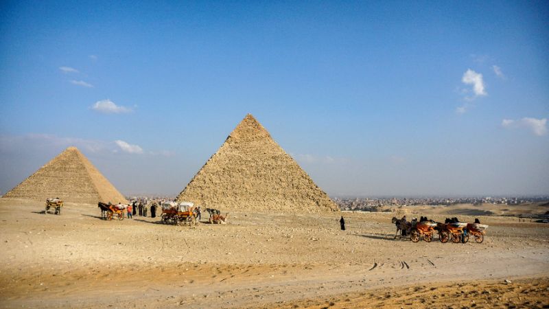 The Giza pyramids south of the Egyptian capital Cairo is the only surviving structure of the seven wonders of the ancient world and a magnet for tourists (AFP Photo/Mohamed el-Shahed)