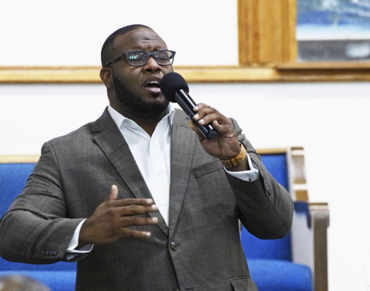 FILE - This Sept. 21, 2017, file photo provided by Harding University in Search, Ark., shows Botham Jean leading worship at a university presidential reception in Dallas. Jean was shot and killed by Dallas police officer Amber Guyger in his apartment in Dallas. The former Dallas police officer has been indicted on a murder charge announced Friday, Nov. 30, 2018. Guyger was arrested days after the Sept. 6 shooting that killed 26-year-old Jean, who was from the Caribbean island nation of St. Lucia. (Jeff Montgomery/Harding University via AP, File)