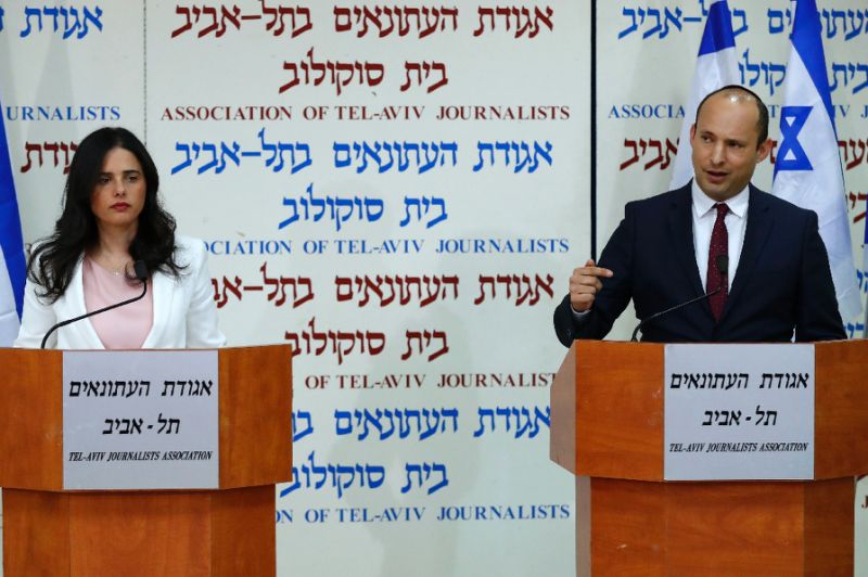 Israel's Minister of Education Naftali Bennett (R) and Israeli Justice Minister Ayelet Shaked (L) announce the formation of new political party HaYemin HeHadash or “New Right”, during a press conference in  Tel Aviv on December 29, 2018