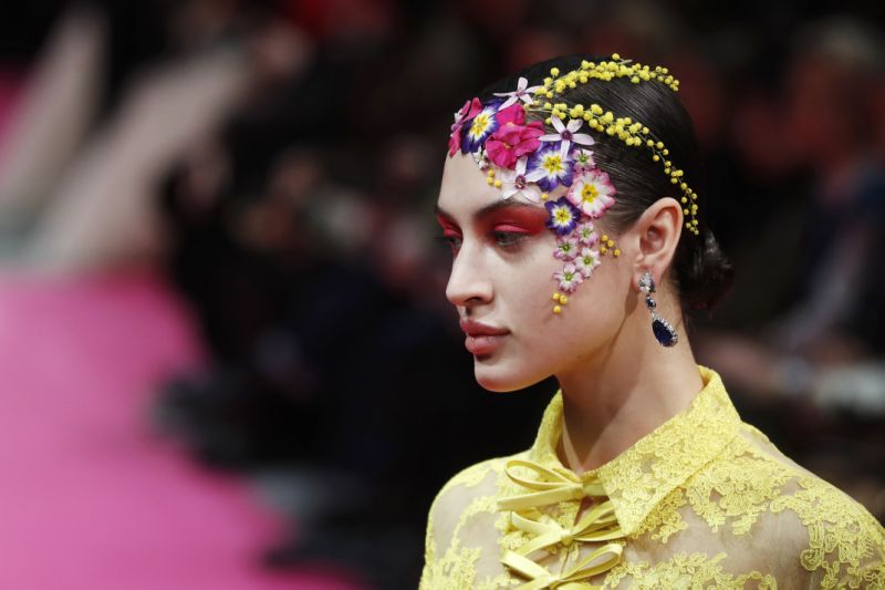 Flowers framed the face at Alexis Mabille.