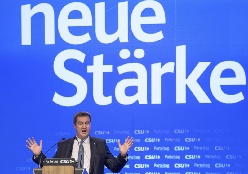 New head of the Christian Social Union CSU Markus Soeder speaks at a party meeting in Munich, Germany, Saturady, Jan. 19, 2019. Letters in background read 