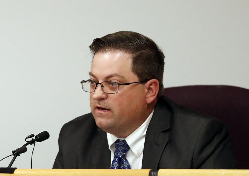 Arizona Nursing Board President Randy Quinn speaks during a special meeting Friday, Jan. 25, 2019, in Phoenix, regarding former Hacienda HealthCare nurse Nathan Sutherland, who is accused of raping an incapacitated woman who later gave birth. Arizona Gov. Doug Ducey is looking into whether the state can remove the board of directors of Hacienda HealthCare. (AP Photo/Matt York)