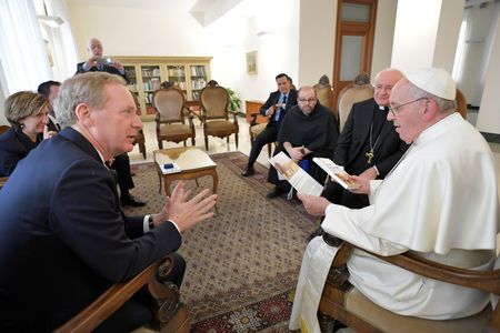 Microsoft President and Chief Legal Officer Brad Smith meets with Pope Francis at Saint Martha's House at the Vatican, February 13, 2019. Vatican Media/Handout via REUTERS