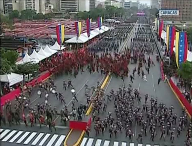 Uniformed military members break ranks and scatter after a loud bang was heard during a ceremony in August 2018, which President Nicolas Maduro said was a drone attack (AFP Photo/HO)