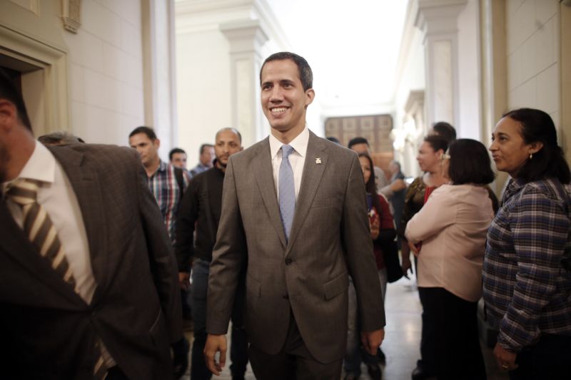 Venezuela' self proclaimed interim president Juan Guaido smiles as he arrives at the National Assembly, in Caracas, Venezuela, Wednesday, Feb. 13, 2019. Guaido said Wednesday that the National Assembly has appointed six executives to a transitional board for its PDVSA state-owned oil company and its U.S. subsidiaries, including Houston-based refiner Citgo. (AP Photo/Ariana Cubillos)