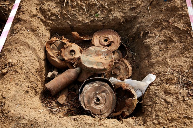 The Islamic State group planted mines and rigged buildings with explosives as they withdrew from territory they lost during fighting in Syria