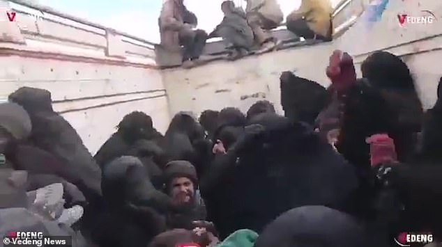 Transport: The footage appears to show the ISIS brides being taken to the camp in the back of a truck as the terror group's last holdout in Baghouz is evacuated