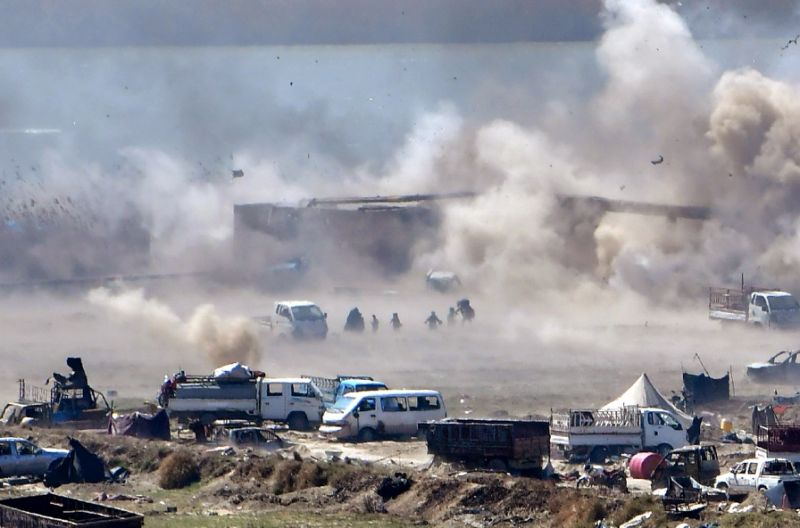 Die-hard Islamic State group fighters are confined to a tiny area on the banks of the Euphrates River in Syria
