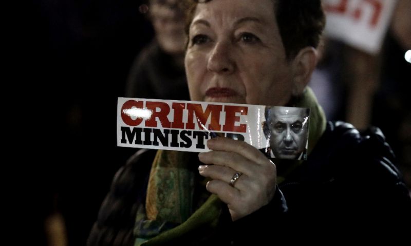 Israeli Prime Minister Benjamin Netanyahu is facing a battle over corruption allegations ahead of elections in April (AFP Photo/Thomas COEX)