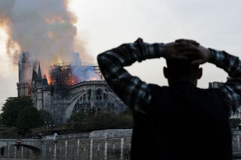 The Notre-Dame cathedral was engulfed in flames in central Paris on April 15 (AFP Photo/Geoffroy VAN DER HASSELT)