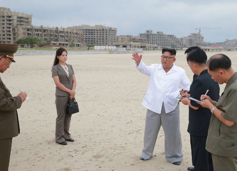 North Korean leader Kim Jong Un (3rd R) visited the resort at least three times last year according to state media