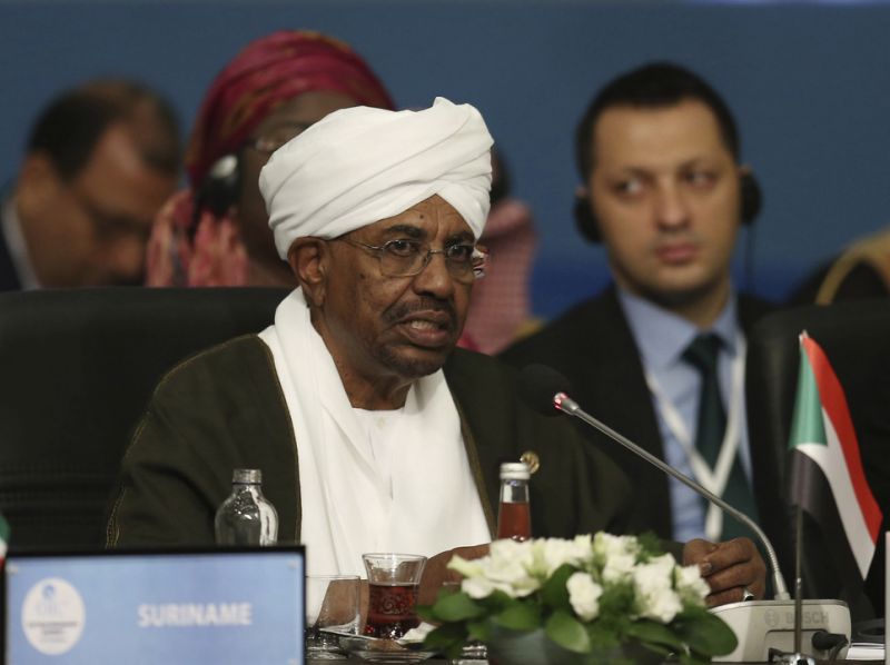 FILE - In this May 18, 2018, file photo, Sudan's President Omar al-Bashir speaks during the extraordinary summit of the Organization of Islamic Cooperation (OIC), in Istanbul, Turkey. Sudan's armed forces were to deliver an 