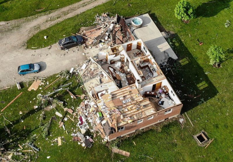 Storm-damaged homes in Brookville, Ohio, on May 28. (Photo: John Minchillo/AP)