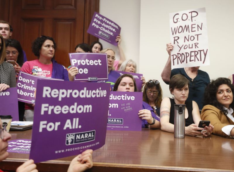 Supporters crowd a meeting room before a roundtable discussion at the Georgia State Capitol in Atlanta on Thursday, May 16, 2019 to discuss abortion bans in Georgia and across the country. Georgia was the fourth state this year to pass anti-abortion 