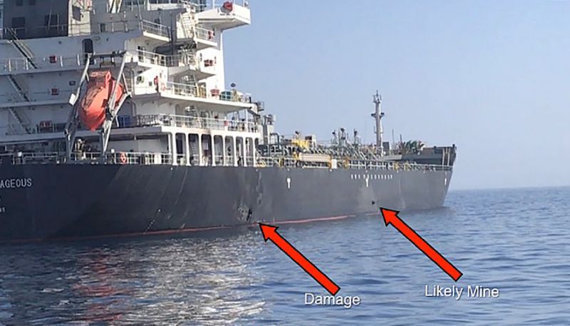 Slide provided by US Central Command reportedly shows an explosion (L) and a likely limpet mine on the hull of the M/V Kokuka Courageous in the Gulf of Oman (AFP Photo/HO)
