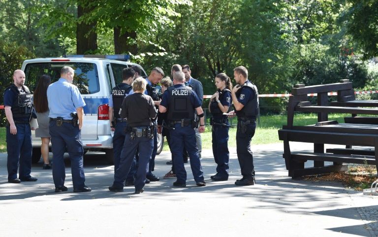 Police stand at the Berlin crime scene in August 2019 where a Georgian man who had fought against Russian forces in Chechnya was shot
