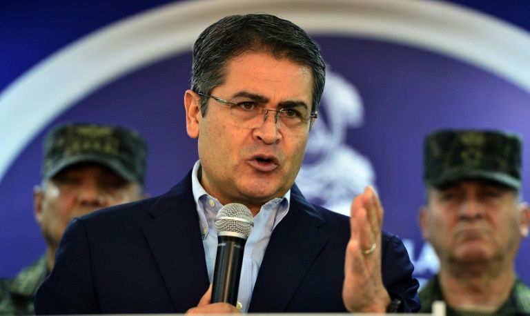 Honduran President Juan Orlando Hernandez, seen in this file photo from June 2019, has dismissed the accusation as 'absurd' (AFP Photo/ORLANDO SIERRA)