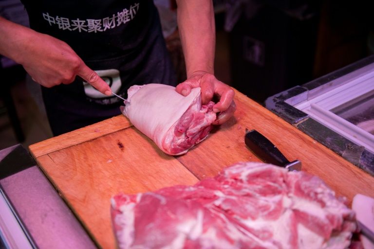 Pork prices surged almost 70 percent last month as swine fever ravages China's pig herds