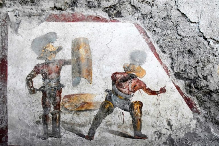 The fresco was uncovered in what experts think was a tavern frequented by gladiators (AFP Photo/Handout)