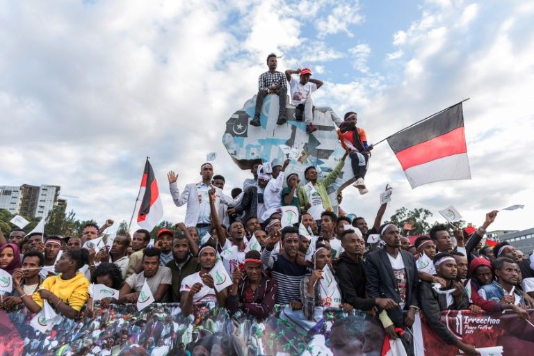 The annual Irreecha festival marks the end of the rainy season and the start of the harvest season (AFP Photo/YONAS TADESSE)
