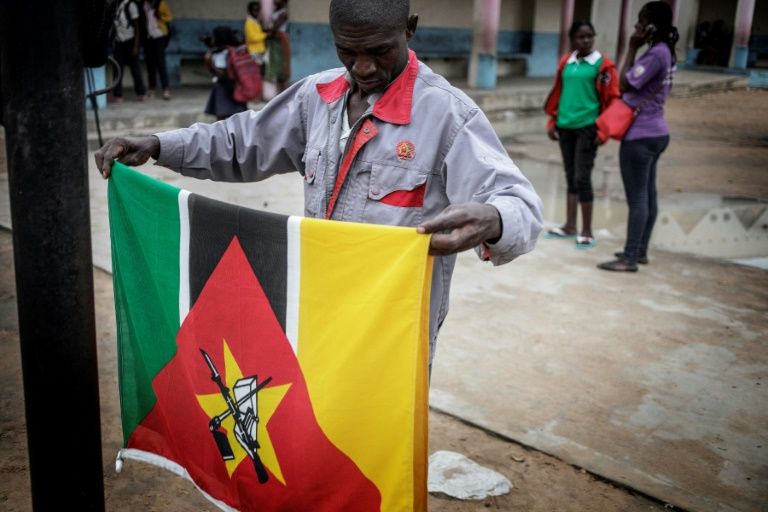 Soviet symbols in Africa include the Kalashnikov rifle featured on the flag of Mozambique (AFP Photo/GIANLUIGI GUERCIA)
