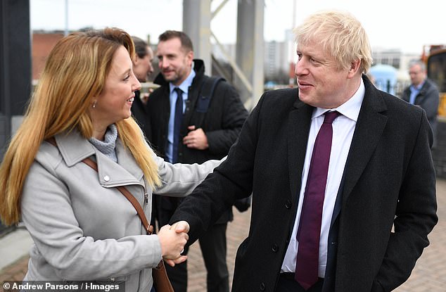The PM writes that if the Conservatives do not win, the 'nightmare alliance' of Mr Corbyn and SNP leader Nicola Sturgeon would become a reality on Friday the 13th. He is pictured above in Wigan