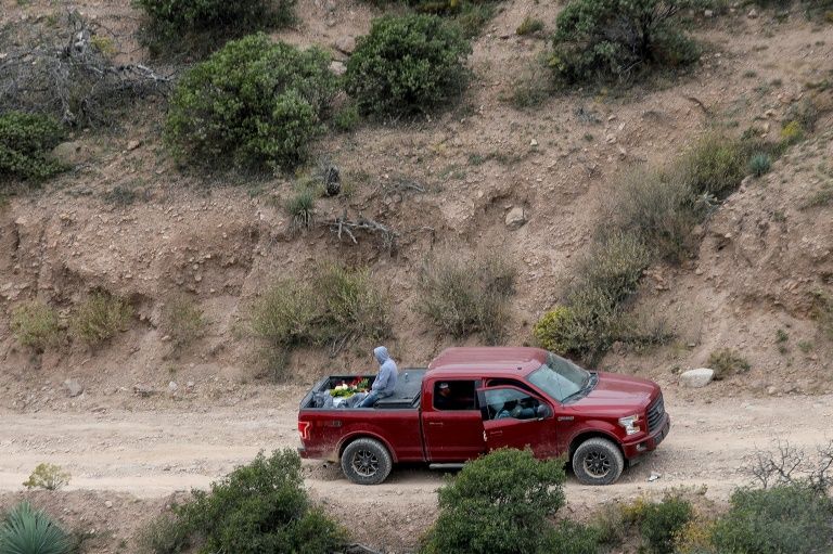 A vehicle transporting a coffin of one of the nine Mormon victims shot dead in Mexico in November 2019