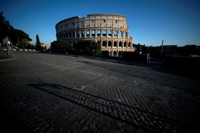 Italians will desperately hope that weeks of living under a lockdown in which even a jog in the park was eventually banned was the price worth paying for beating back the new disease (AFP Photo/Filippo MONTEFORTE)