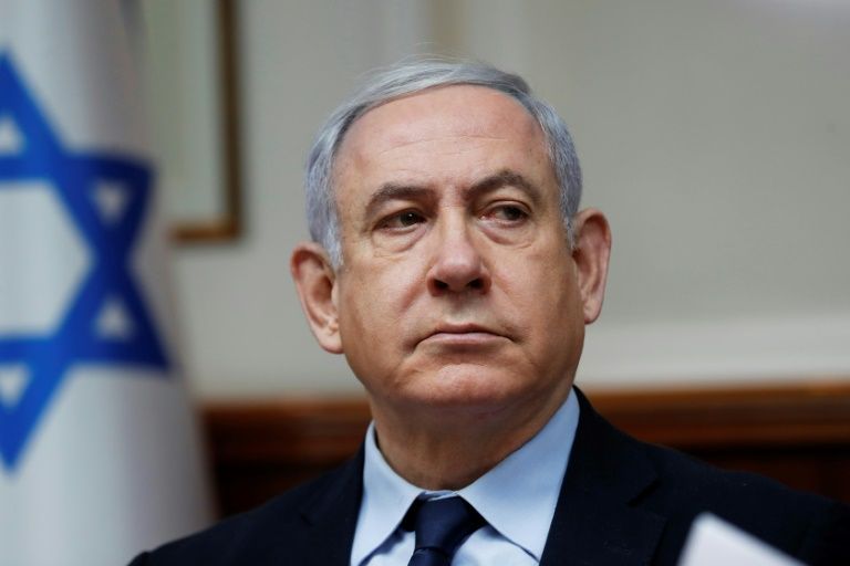 Prime Minister Benjamin Netanyahu will attend the opening of his corruption trial, becoming the first sitting Israeli premier to face criminal charges (AFP Photo/RONEN ZVULUN)