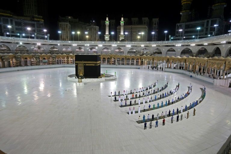 A handful of worshippers pray at the Islam's holiest shrine, the Grand Mosque complex in Saudi Arabia's holy city of Mecca, usually teeming with pilgrims as the annual hajj pilgrimage approaches (AFP Photo/STR)