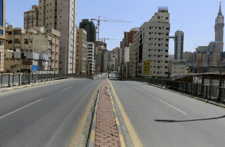 Saudi Arabia's coronavirus lockdown delivered a heavy blow to the holy city of Mecca (AFP Photo/-)