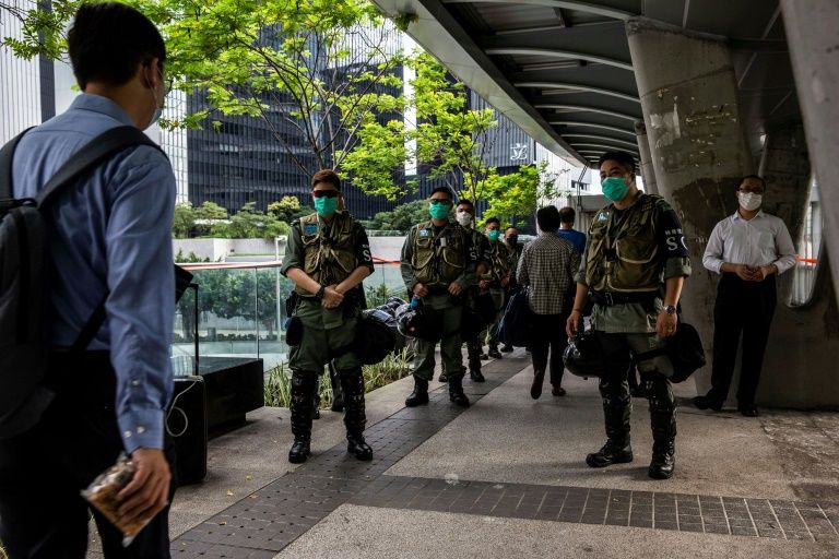 Hong Kong riot police set up a checkpoint near the Legislative Council on June 4 -- the 31st anniversary of the 1989 Tiananmen Square crackdown (AFP Photo/ISAAC LAWRENCE)