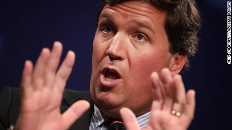 Analysis: Tucker Carlson's attempt to smear senator who lost both legs in Iraq War crosses the line