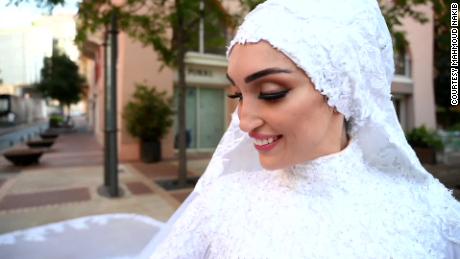 One moment, they were filming the bride in her wedding dress. Then came the explosion