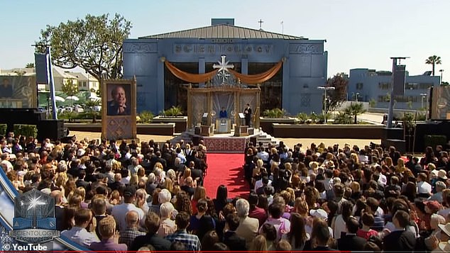 The organization has been accused of acting like a cult and has faced a number of allegations from former members of abuse, human trafficking and intimidation. The 2010 event is pictured