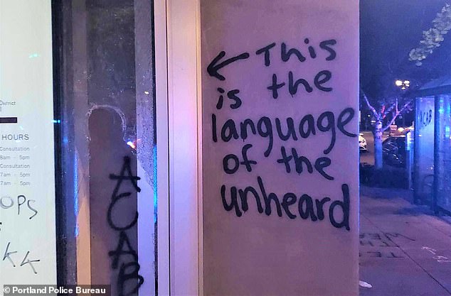 In total police say 19 people were arrested, some of whom were carrying knives and a collapsible baton, after vandals attacked a nearby business