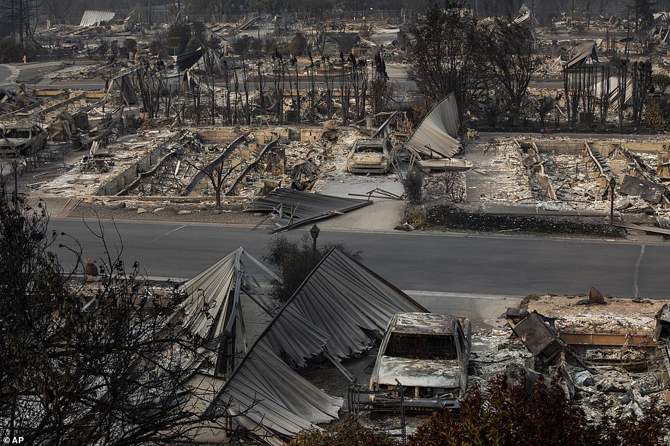 A neighborhood destroyed by fire is seen as wildfires devastate the region on Thursday in Talent, Oregon