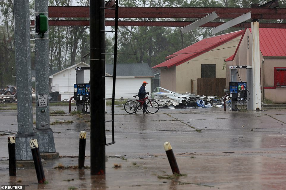 Heavy rain pours down in Lake Charles Friday afternoon as Delta headed for the area hit by Hurricane Laura weeks ago